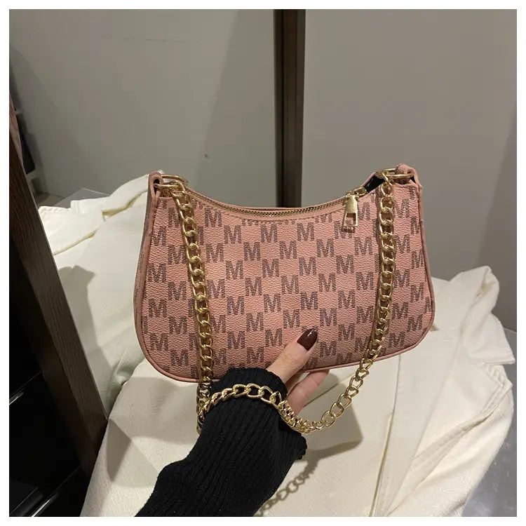 Beige M monogram shoulder bag close-up