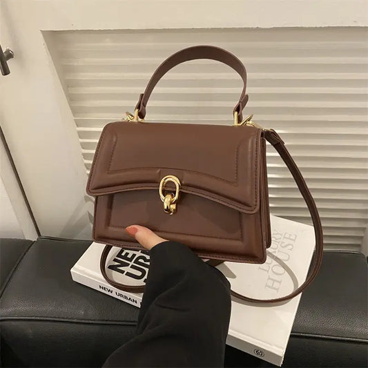 Bolso de lujo con asa superior para mujer – Elegante bolso de hombro cruzado con herrajes dorados